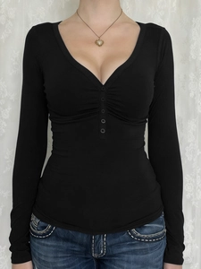 Y2K style black V-neck long sleeve tee with decorative buttons and ribbed texture