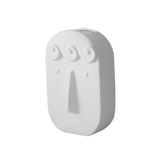 Modern white ceramic face vase with abstract relief design for Nordic home decor