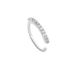 Macro detail of silver nose ring with shimmering floral leaf diamond inlays on white base