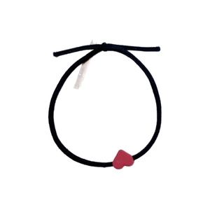 Minimalist elastic hair tie with red heart charm and durable black woven cord design