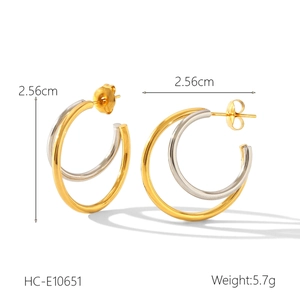 Detail view of two-tone geometric stainless steel earrings with 2.56cm size dimensions