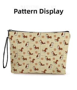 Detail showing cartoon squirrel pattern and fine plaid fabric on the makeup bag