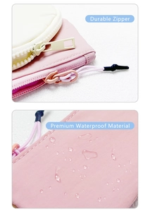 Detail view of pink nylon wrist pouch showing durable zipper and premium waterproof fabric