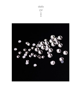 Macro view of multi-faceted sparkling glass rhinestones for nail art decoration