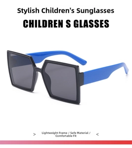 Detail of square black frame kids sunglasses with bright royal blue temples and grey lenses