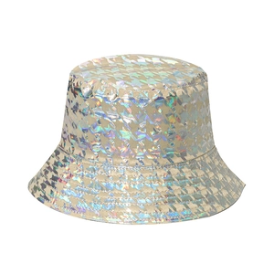 Detailed view of holographic bucket hat with star pattern texture and shiny metallic finish