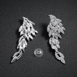 Elegant silver wing drop earrings with sparkling rhinestones for bridal and party wear