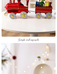 Detail of red Christmas train ornament with Santa Claus and miniature gift boxes
