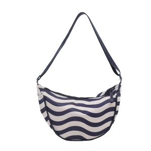 Navy and white wave patterned half moon crossbody bag with adjustable strap for women