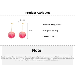 Detailed view of pink resin peach earrings with dimensions 6x2.1cm and alloy specs
