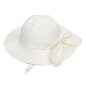 Close-up of white summer sun hat with large bow detail and adjustable windproof strap