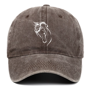 Detail of horse head embroidery on washed cotton fabric of dark brown baseball cap