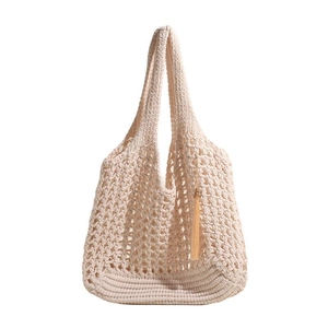 Beige hollow knit beach tote bag with fringe charm and large capacity for summer