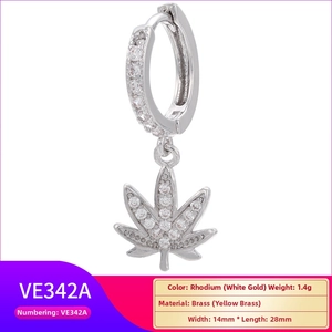 Macro detail of leaf-shaped rhodium plated brass earring set with cubic zirconia stones
