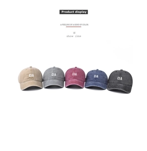 Cinq casquettes de baseball CIA en coton délavé vintage de couleurs variées sur fond blanc