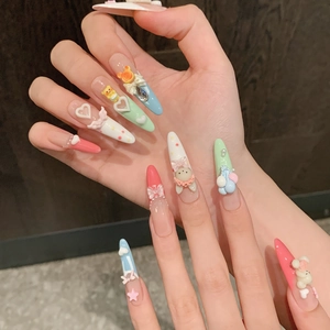 Handmade press-on nails with 3D cartoon bear and colorful macaron gradients