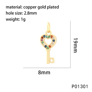Detailed view of heart key pendant with dimensions and copper gold plated material info