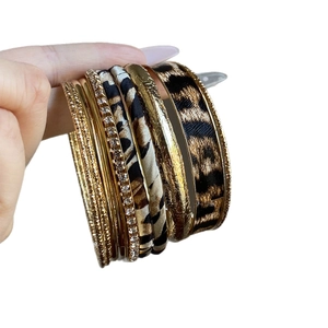 Set of 10 bohemian style leopard print and gold textured metal bangles for women