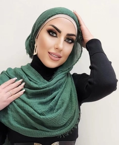 Dark green crinkle cotton linen hijab scarf for women measuring 180x90cm in solid color