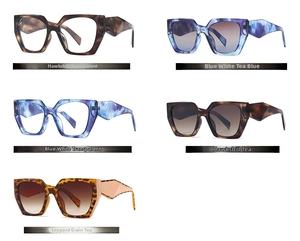 Collection of oversized geometric cat-eye sunglasses in various patterned acetate frames