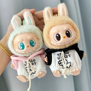 Close-up of Labubu plushies in green and brown rabbit hoodies with Hello Windy prints