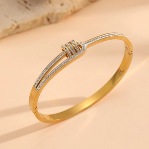 Bracelet jonc en acier inoxydable plaqué or 18k avec zircons sur pierre rose douce