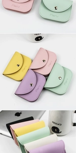 Macro shot of colorful PU leather card holders with snap button closure in pastel colors