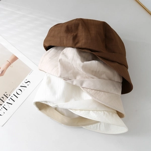 Japanese minimalist soft brim sun caps in brown, beige and white with textured fabric
