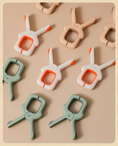 Close-up of durable windproof quilt clips in Morandi colors with soft non-slip grip pads