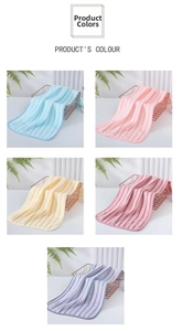 Detailed close-up of striped coral fleece towels in five assorted pastel colors