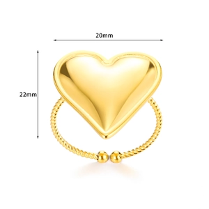 Detail showing 20mm gold heart ring dimensions with a twisted band and polished finish