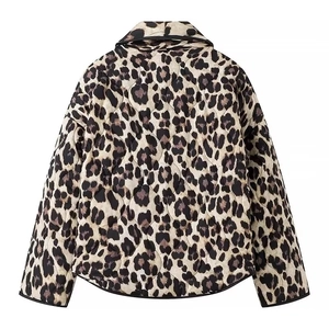 Detailed back view of a quilted leopard print jacket with diamond stitching and black piping
