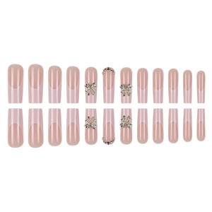 French press-on nails with 3D bows and rhinestones on long ballerina pink tips