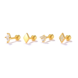 Set of four gold sterling silver stud earrings with marquise and geometric zircons