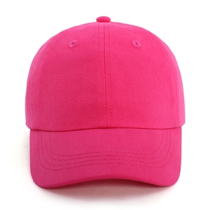 Close-up of deep pink cotton baseball cap showing twill fabric and stitching details