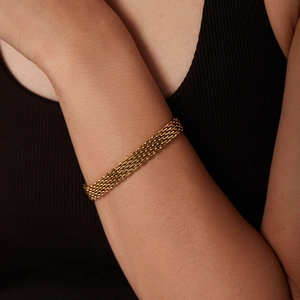 Bracelet chic en acier inoxydable plaqué or 18 carats style maille pour femme