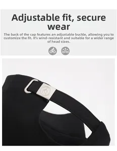 Close-up of black cotton baseball cap showing adjustable metal buckle and durable fabric