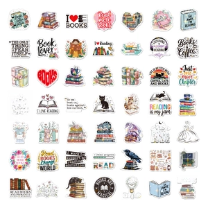 Flat lay of 49 holographic book lover stickers featuring cats, owls and floral motifs