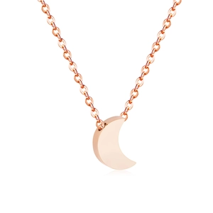 Macro shot of polished rose gold crescent moon pendant on an adjustable O-shaped chain