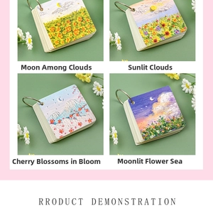 Detail of four artistic oil painting cover notebooks with silver metal loose-leaf rings