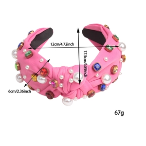 Pink knotted fabric headband with pearls and gemstones showing size and weight details