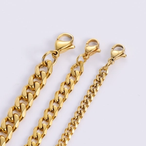 Set of three polished 18k gold-plated stainless steel Cuban link chains in various widths