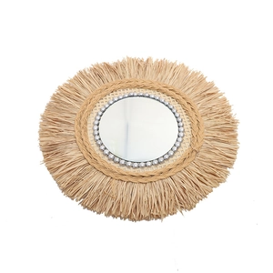 Bohemian handmade round rattan mirror with gray beads and natural raffia fringe
