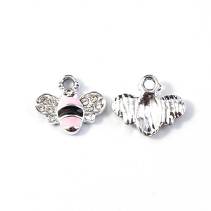 Detailed front and back view of honey bee pendant with pink enamel and crystals