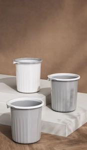 Close-up of modern vertical stripes and press ring on high-quality plastic trash bins