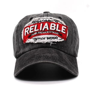 Washed charcoal baseball cap with red vintage embroidery on a white background