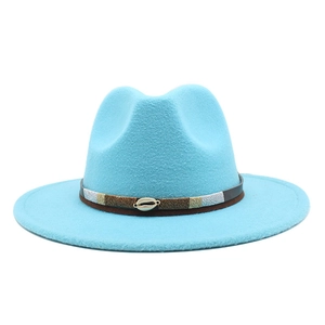 Detail of light blue wool fedora featuring a shell ornament and braided decorative band