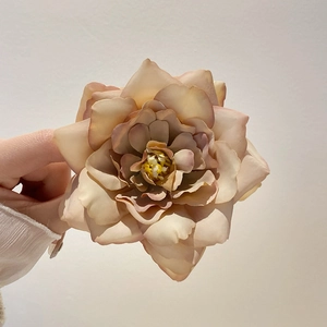 Elegant peach pink fabric flower hair claw clip for sweet and stylish hairstyles