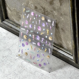 3D embossed sea horse and shell nail art stickers with metallic texture for manicures