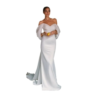 White off-shoulder mermaid wedding dress with organza puff sleeves and elegant long train
